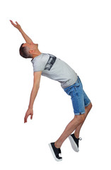 Side view of a man dancing in shorts.