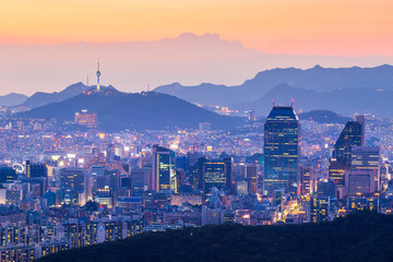 Fototapeta na wymiar Seoul tower and Skyscrapers, Beautiful city of lights at night, Seoul, South Korea.