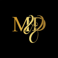 Initial letter M & D MD luxury art vector mark logo, gold color on black background.