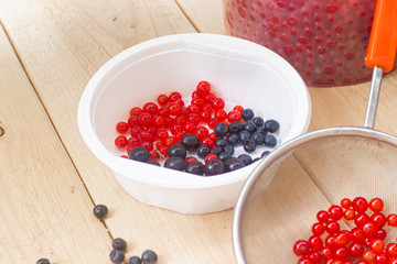 Berries from his garden. Garden berries. Berries from the bushes. Red currant black currant gooseberry. Variety of berries.