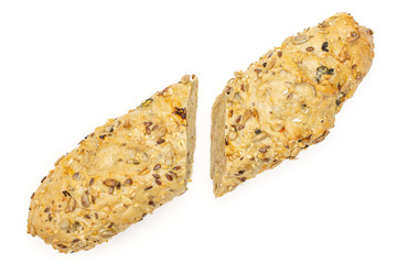 Group of two halves of fresh cereal baguette flatlay isolated on white background