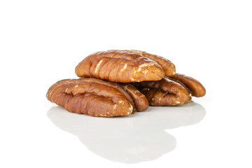 Group of three whole fresh brown pecan nut half heap isolated on white background