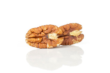 Group of two whole sweet fresh brown pecan nut half isolated on white background