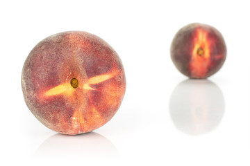 Group of two whole fresh red peach one is in the front isolated on white background