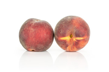 Group of two whole fresh red peach isolated on white background