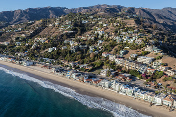 Aerial view of Malibu beaches, homes and hillsides north of Santa Monica on Pacific Coast Highway in Los Angeles County, California.  