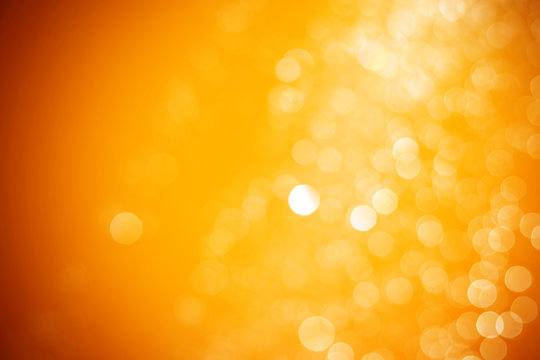 Abstract orange and yellow light bokeh background. Bokeh Backgrounds color gold.
