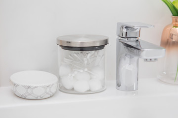Skin care on the wash basin In luxury bathroom