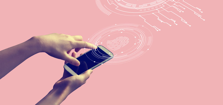 Fingerprint scanning theme with person holding a white smartphone