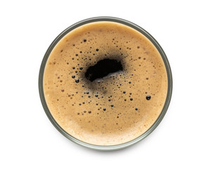 Glass of dark stout beer top view with foam. Isolated on white background. with clipping path.