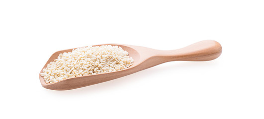White sesame in wooden spoon on white background.