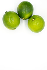 Limes on white background