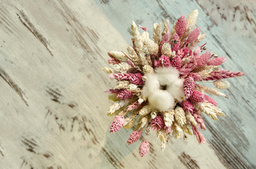 Bunch of wheat ear with cotton flower