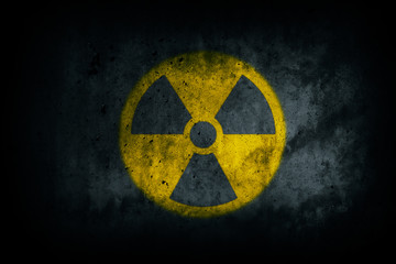 Radioactive (atomic nuclear ionizing radiation) danger warning yellow symbol shape painted on...