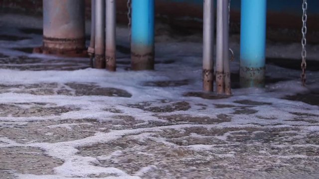 Close-up of sewage treatment pond footage slow motion