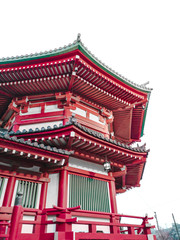 Fototapeta premium Isolated background of ancient Japanese red wooden temple in Japan Tokyo for asian people to make respect and warship.