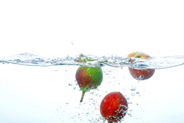 Falling Fruits Into Clean Water 