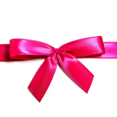 Pink red satin ribbon with knotted bow gift ribbon wrap for Christmas present isolated cut out on simple plain white background. Square format.