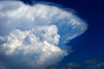 Big Cumulonimbus Cloud in Blue Sky.