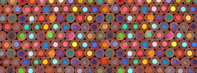 back view of stacked colored pencils