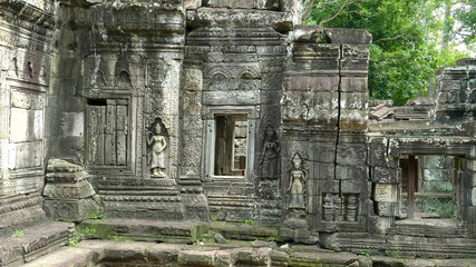 wide view of carved devata at banteay kdei temple near angkor wat