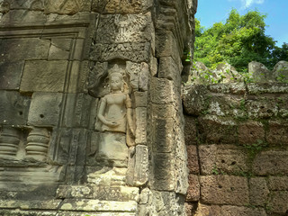 carved statue at the east gate of banteay kdei, angkor wat