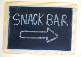 Snack bar sign on chalkboard