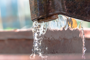 young woman washing her hands