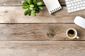 Business accessories on wooden desktop with copyspace