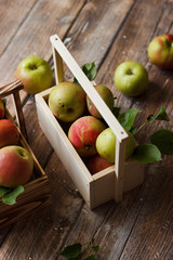 Ripe apples in wooden box. Top view with space for your text