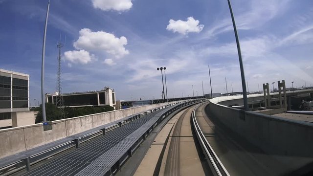 Forward Facing View of Riding the Skylink People Mover Terminal Train Tram at an Airport in Dallas