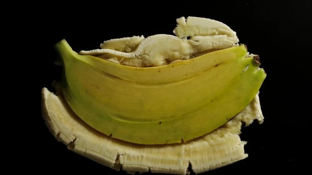 Crush The Whole Banana On A Black Background