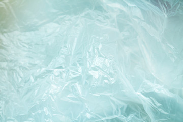 White crumpled plastic background close up polyethylene