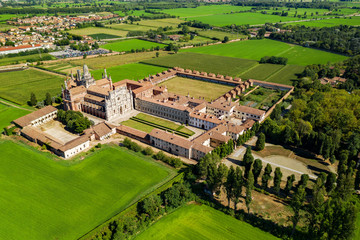 Fototapeta na wymiar Certosa di Pavia Gra-Car (Gratiarum Carthusia - Monastero di Santa Maria delle Grazie - Sec. XIV) - Aerial view