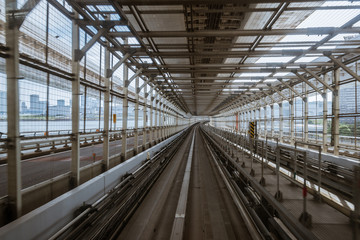 tunnel of monorail road view from front window of a moving train running