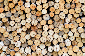 wall firewood - stacked of firewood prepare for the fireplace, barbecue, Background and texture