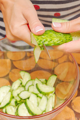 Preparation of salad of fresh vegetables and herbs