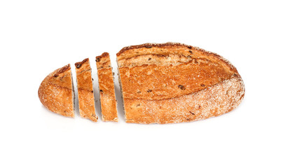 Loaf of whole wheat bread with slices isolated on white background