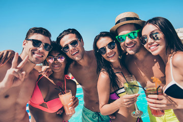 Six wet after swimming friends hanging out enjoying best company drinking ice cocktails