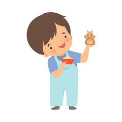 Cute Little Boy Feeding His Hamster, Adorable Kid Caring for Animal Cartoon Vector Illustration