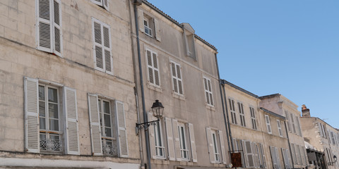 building in street city seaside of La Rochelle in France in web banner template