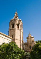 Fototapeta na wymiar Valencia, Spain - 07/21/2019: Miguelete, Torre del Micalet, El Micalet - Valencian Gothic-style bell tower of Valencia Cathedral. It is 50.85 metres high. It is situated on Plaza De La Reina.