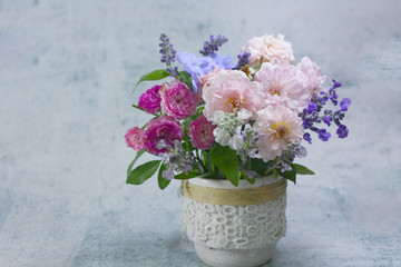 Fototapeta na wymiar Beautiful rose flower vase background.
