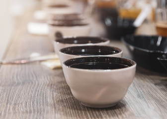 Tasting coffee in glass, Coffee cups on table for tasting..
