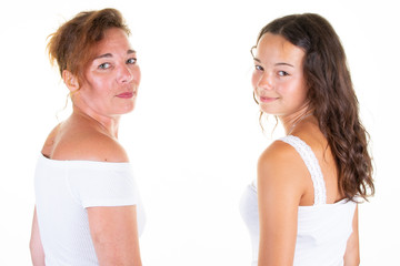 Daughter teenager girl with her mother from behind back view
