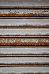 Abstract background - close-up of rusty metal shutter