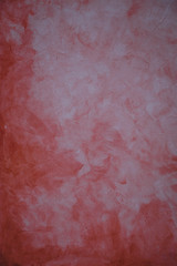 Fototapeta premium Abstract background - close-up of a grunge red wall