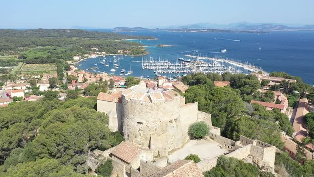 Aerial view of Porquerolles island in National park of Port Cros, the village and harbor of Porquerolles seen from the castle Sainte Agathe