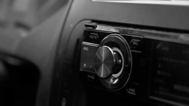 Men Switches And Listens The Radio In The Car 4k