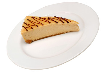 Delicious Cheesecake. Slice of delicious coconut cake on a plate on white isolated background